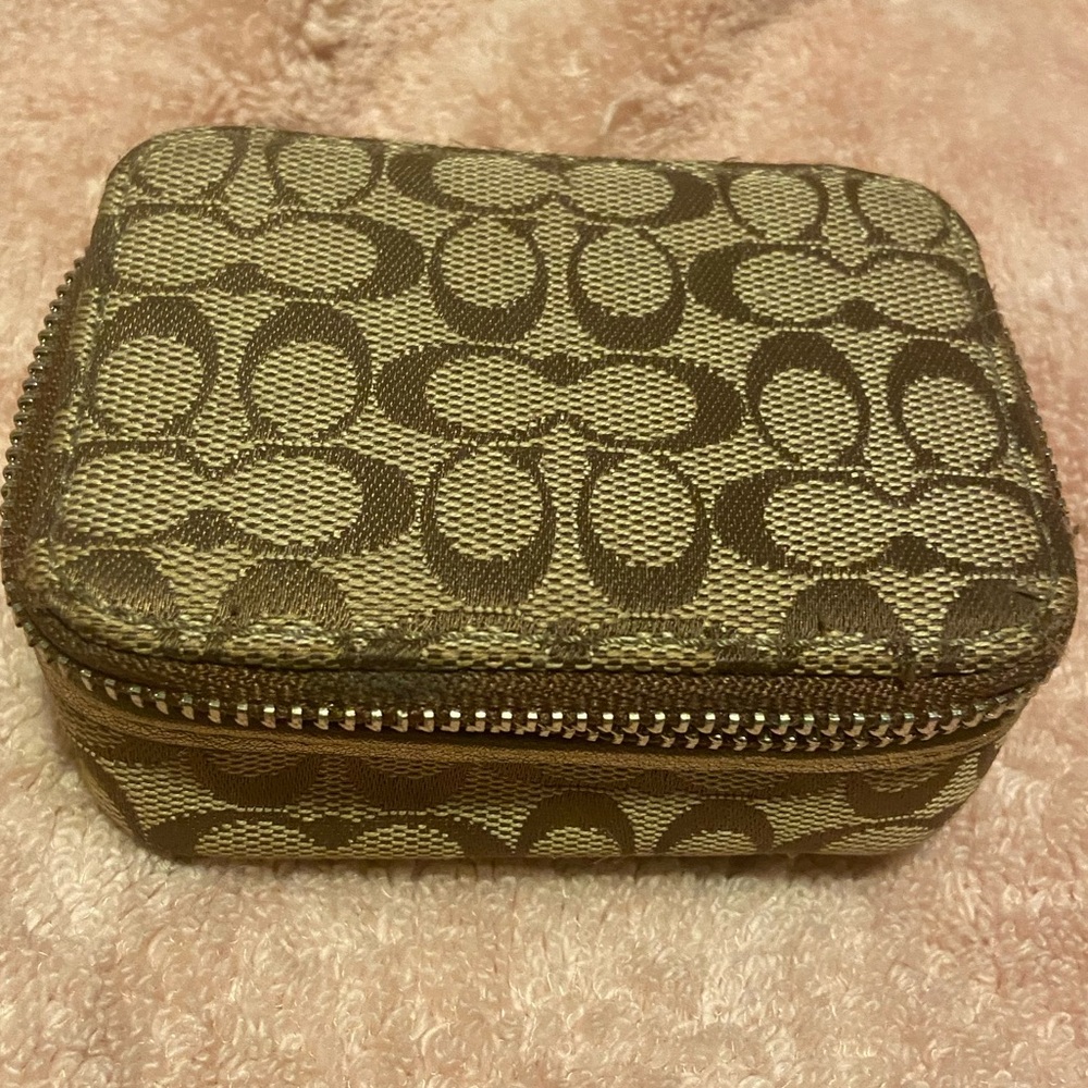 Coach monogram tan gold mini pill essential oil zip case